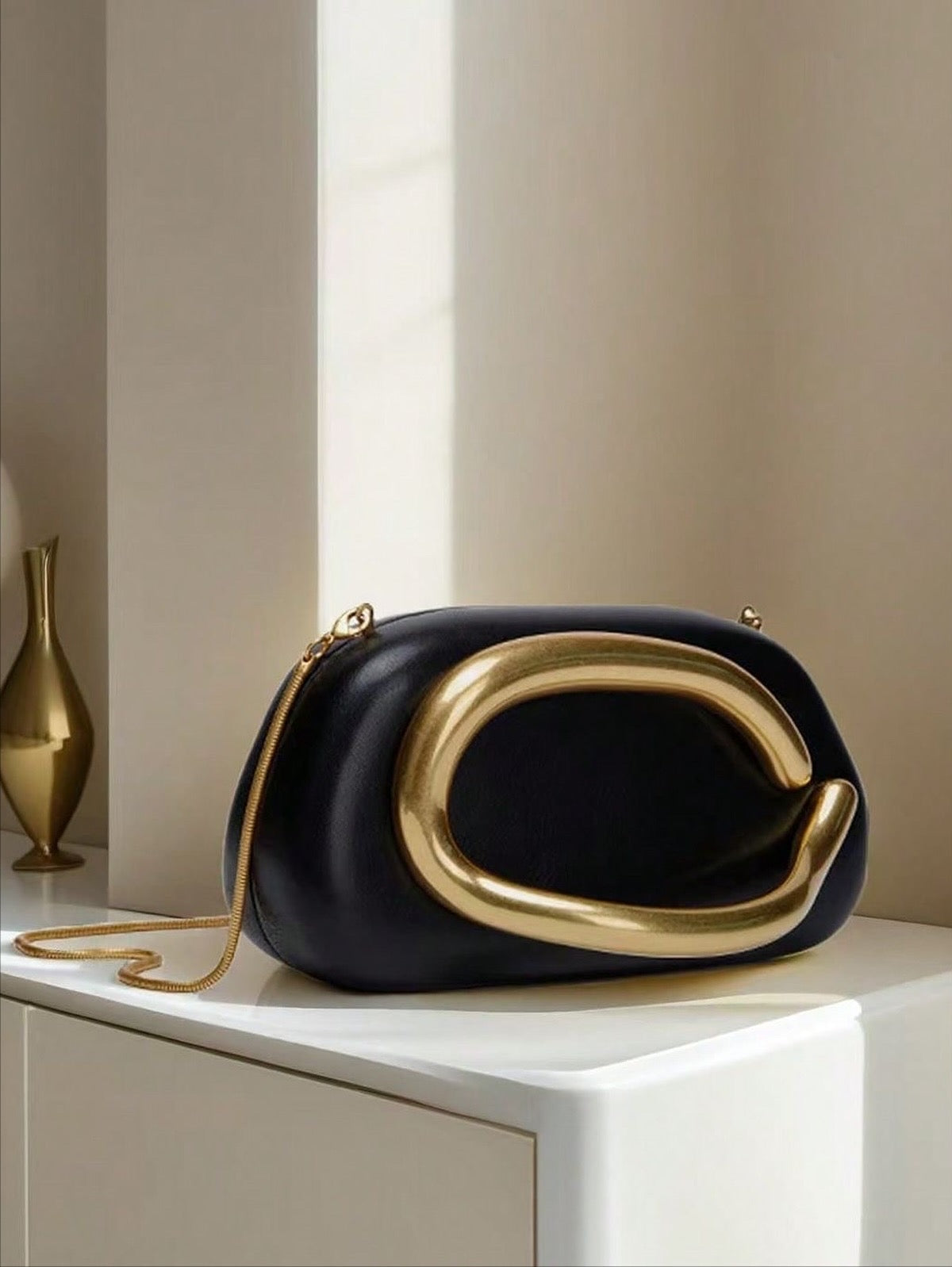 Ashley Black Handheld Clutch