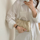 ESTHER PEARL HANDHELD  CLUTCH