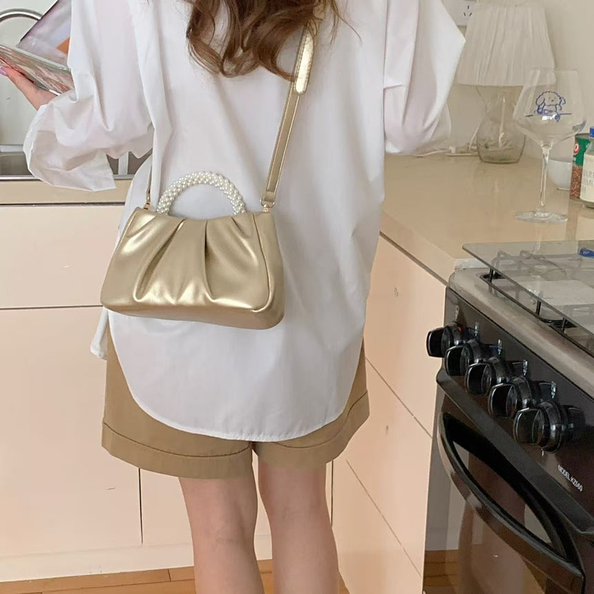 ESTHER PEARL HANDHELD  CLUTCH