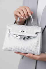 The Muse Silver Clutch