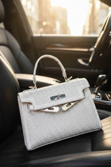 The Muse Silver Clutch