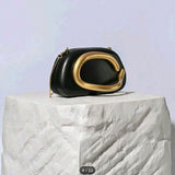 ASHLEY HANDHELD CLUTCH