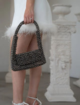 EMMA HANDHELD CLUTCH