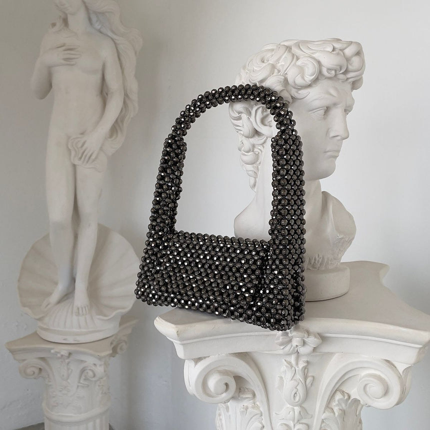 EMMA HANDHELD CLUTCH