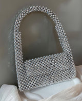 EMMA HANDHELD CLUTCH