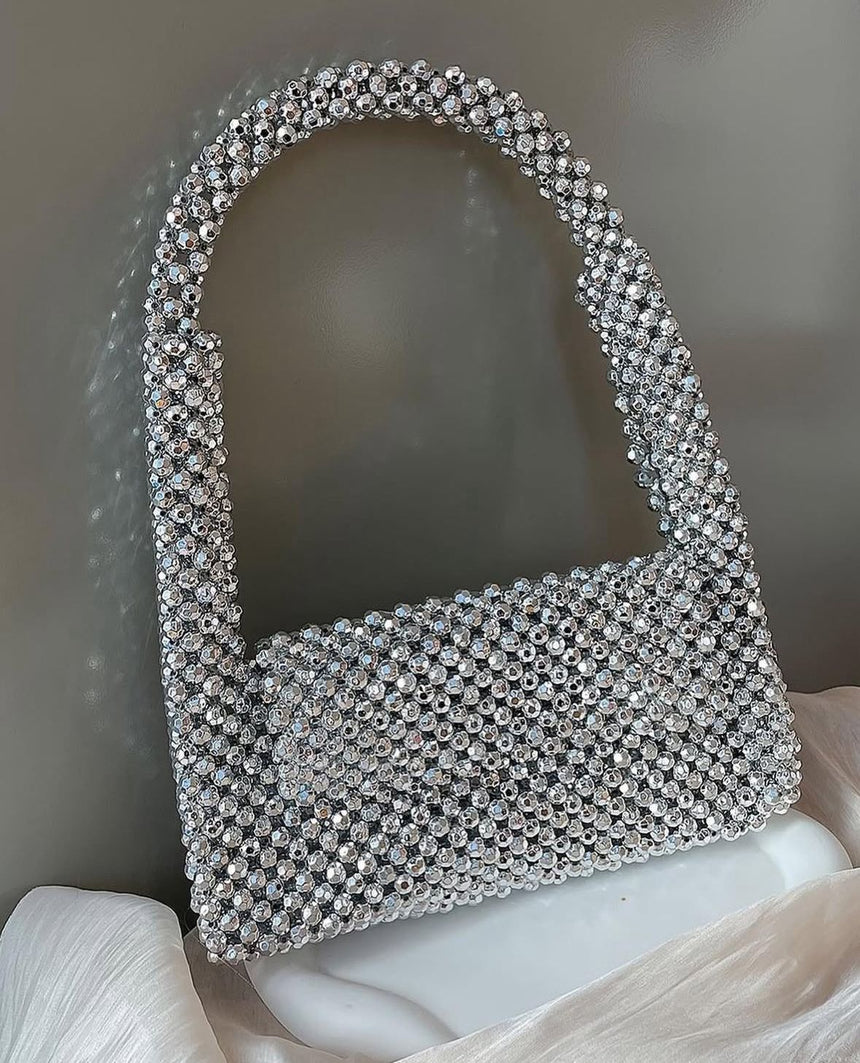 EMMA HANDHELD CLUTCH